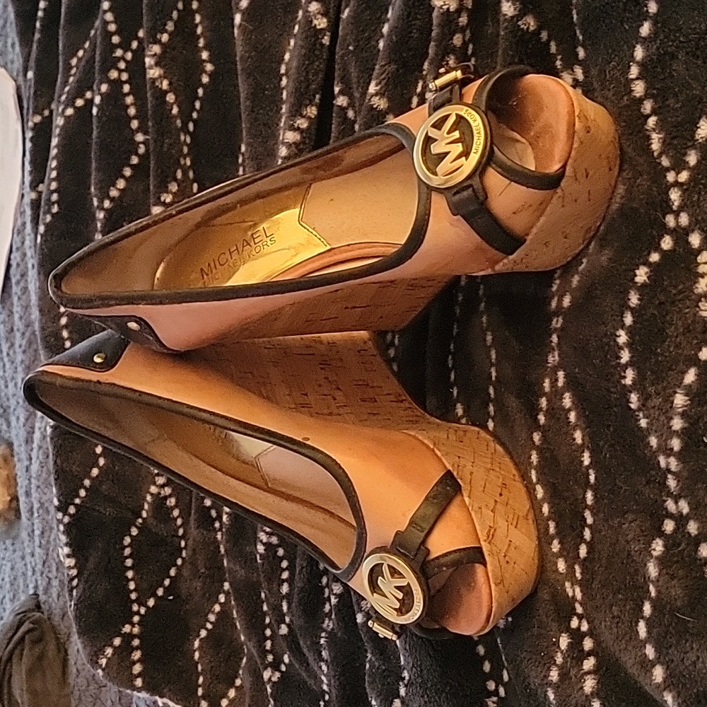 Michael kors size 7 black and tan with gold  embellishments  cork heel.